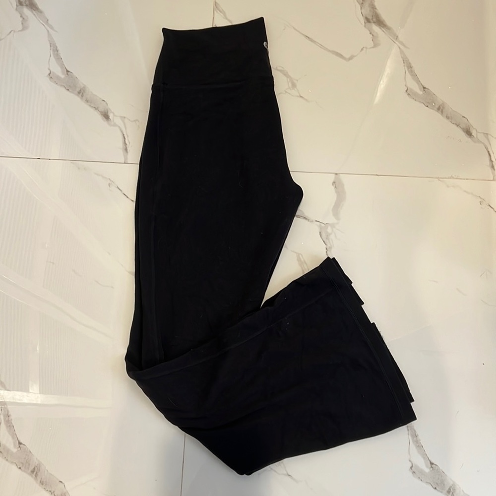 Aritzia TNA flared yoga pants front split